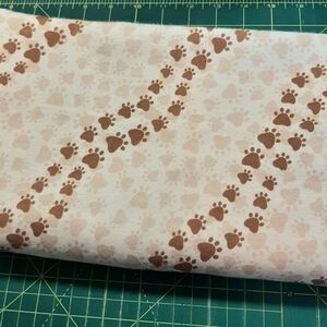 Brown paw print flannel fabric from JoAnn's